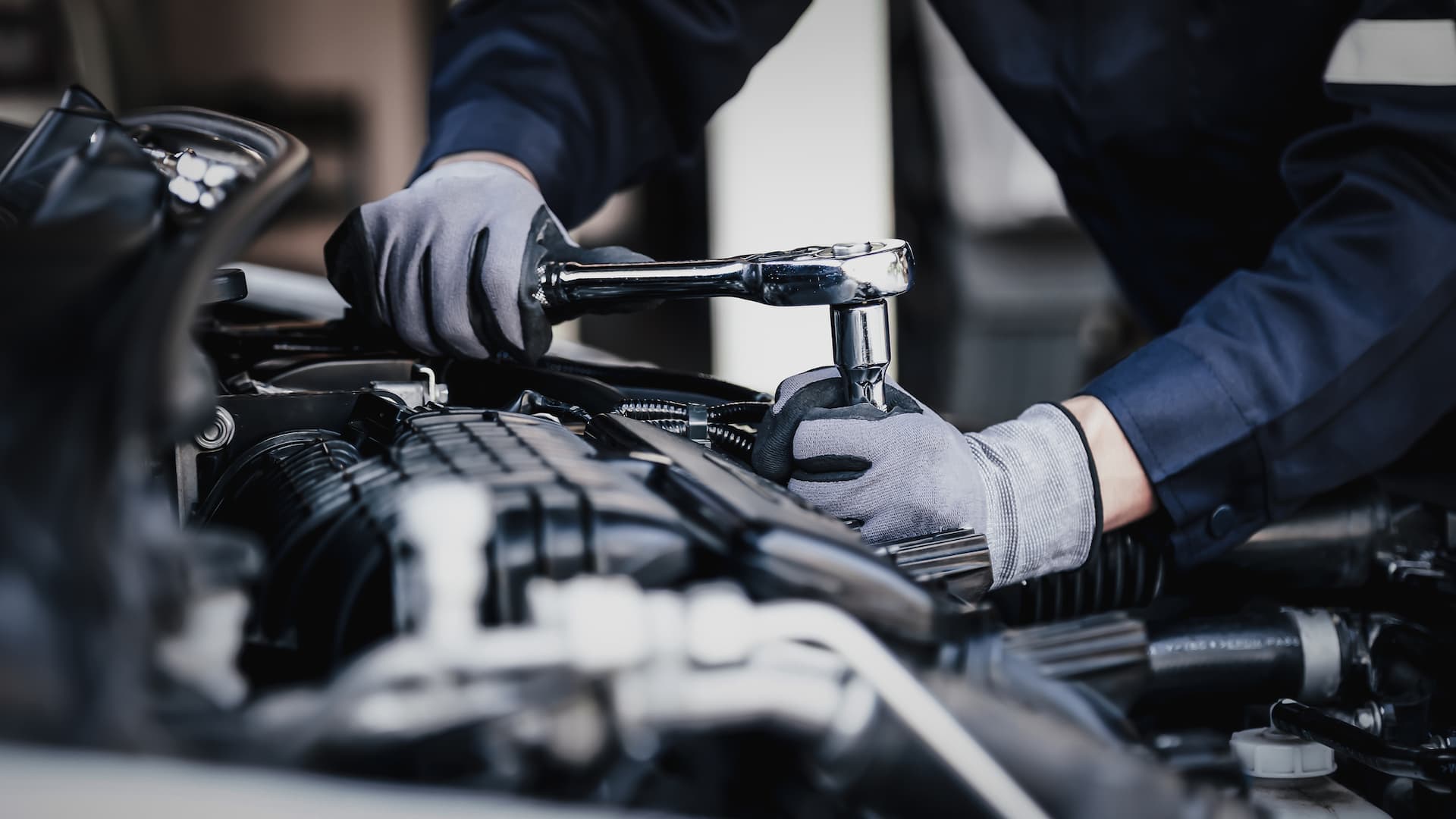 Vehicle inspector checking a used car